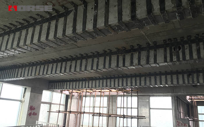 Renforcement d'une poutre en béton armé (BA) par plaque d'acier Renforcement d'une poutre en béton armé (BA) par plaque d'acier