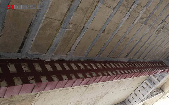 Renforcement des poutres de bâtiment par plaque d'acier collée Renforcement des poutres de bâtiment par plaque d'acier collée