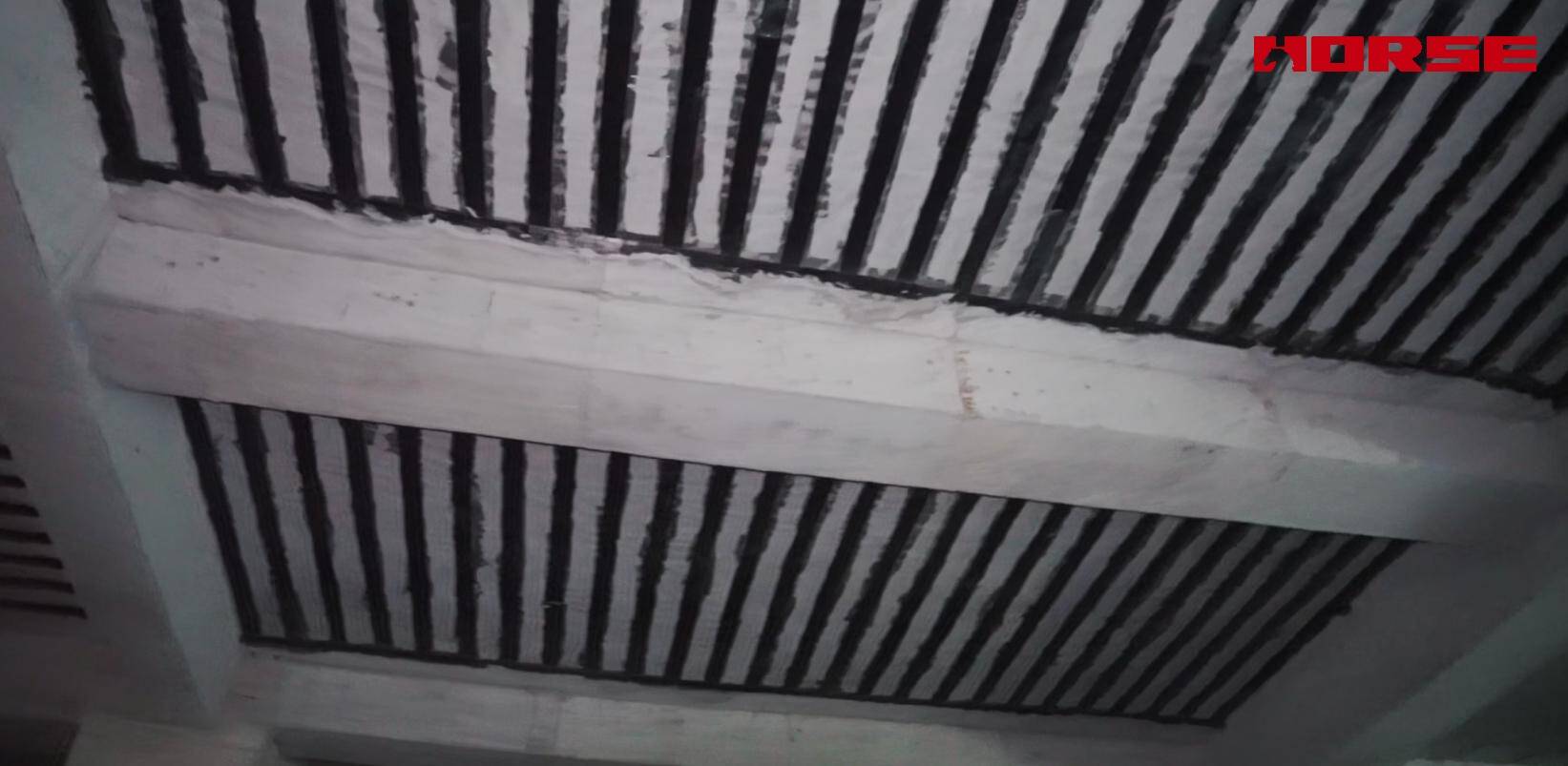 Renforcement d'un centre de croisière en béton par fibre de carbone