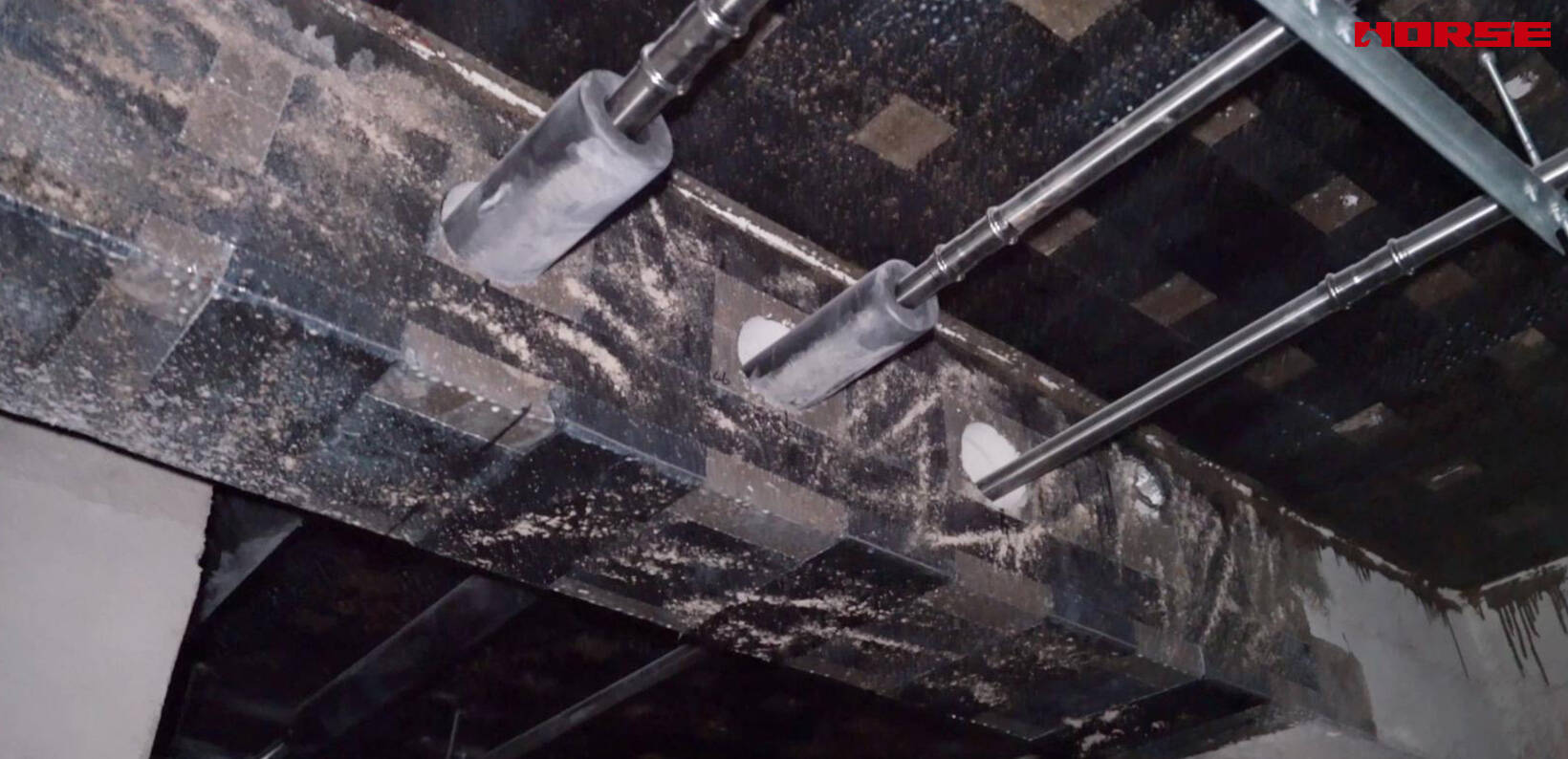 Renforcement des ouvertures de poutres en béton armé par tissus de fibre de carbone