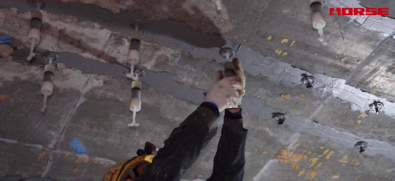 Réparation de poutres en béton fissurées