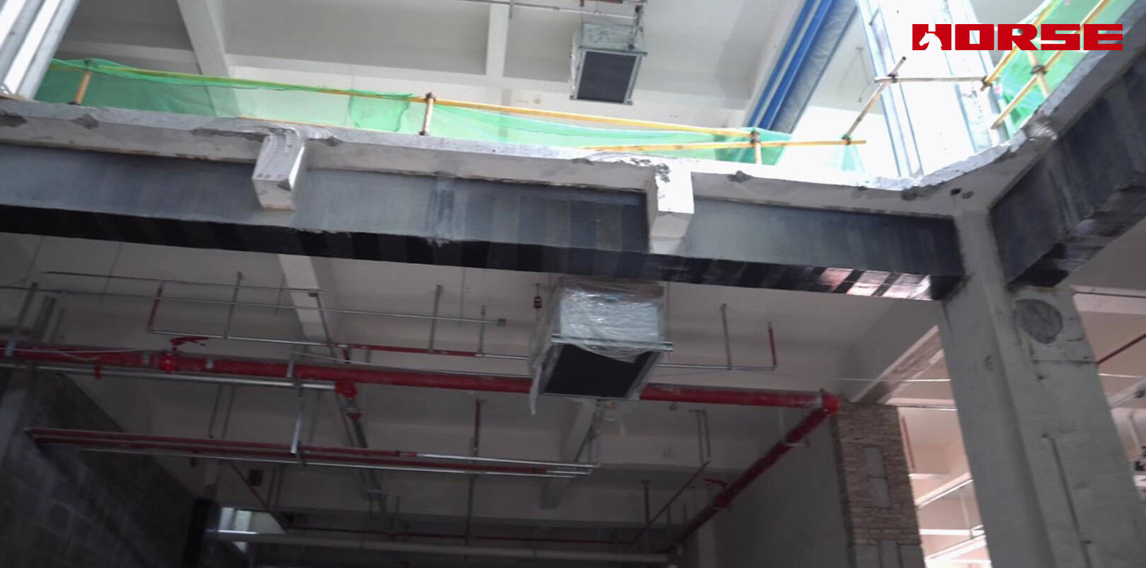 Rénovation structurelle avec fibre de carbone après démolition de la dalle