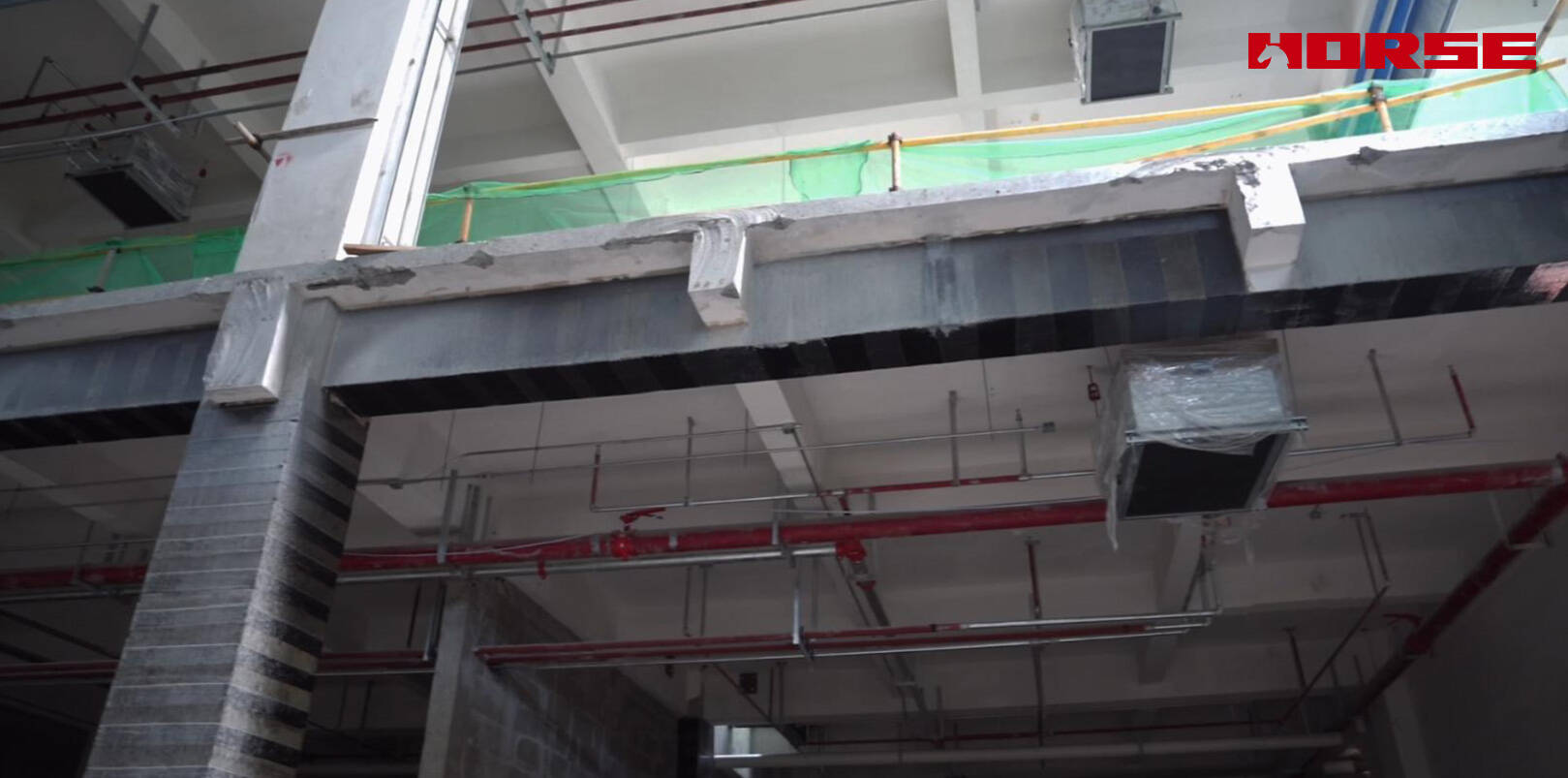 Rénovation structurelle avec fibre de carbone après démolition de la dalle