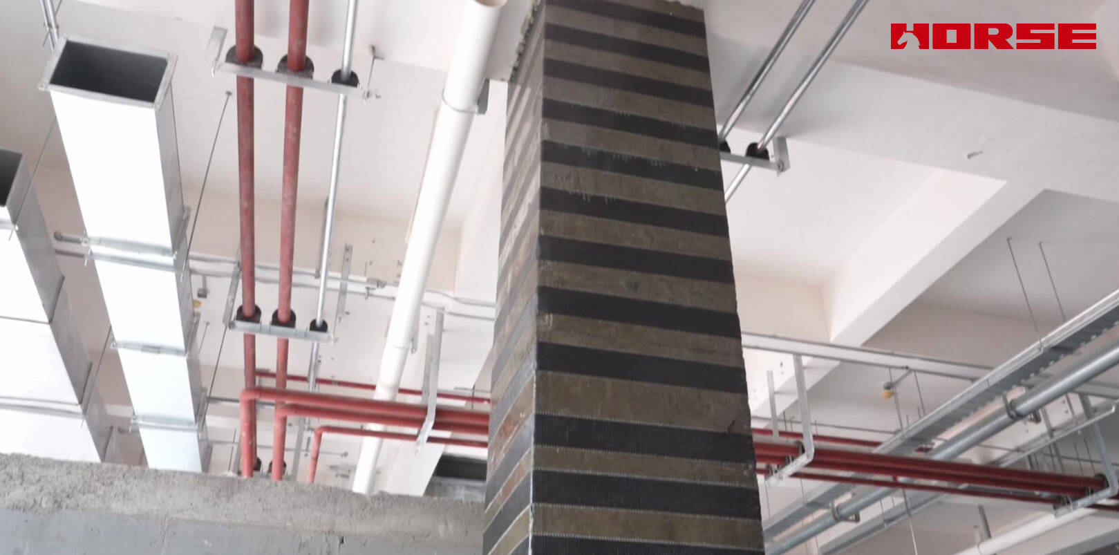 Rénovation structurelle avec fibre de carbone après démolition de la dalle