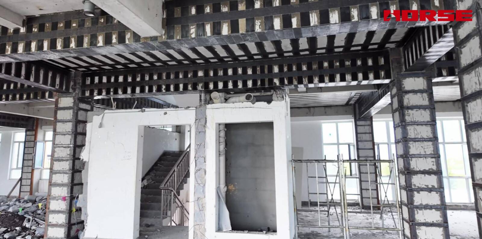 Renforcement structurel pour la conversion d'un bâtiment commercial en établissement pour personnes âgées -- Carbon Fiber & Steel Jacketing Renforcement structurel pour la conversion d'un bâtiment commercial en établissement pour personnes âgées -- Carbon Fiber & Steel Jacketing