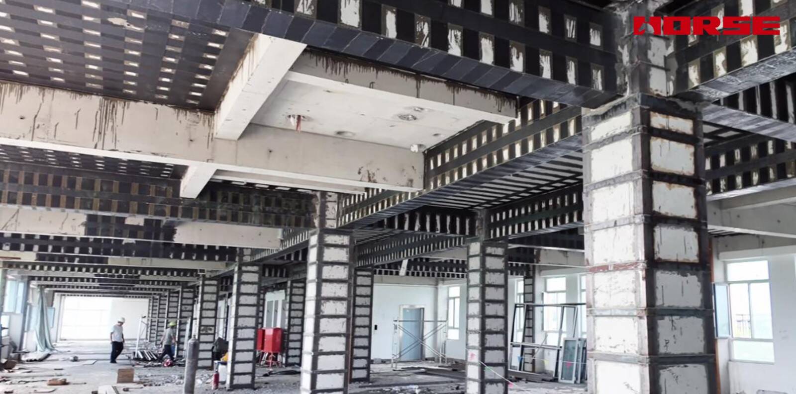Renforcement structurel pour la conversion d'un bâtiment commercial en établissement pour personnes âgées -- Carbon Fiber & Steel Jacketing Renforcement structurel pour la conversion d'un bâtiment commercial en établissement pour personnes âgées -- Carbon Fiber & Steel Jacketing