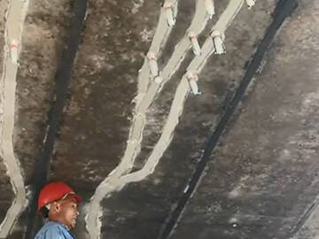 Réparer les fissures du béton du pont avec un adhésif d'injection structurelle
