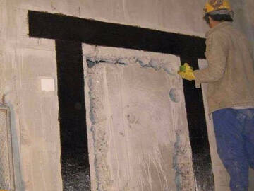 Rénovation d'ouverture par enveloppe de polymère renforcé de fibres de carbone (PRFC) de 300 g