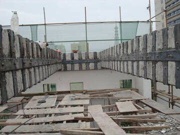 Application de la méthode de collage de plaques d'acier au renforcement des ponts