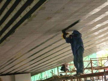 Enveloppe en PRFC pour le renforcement des ponts