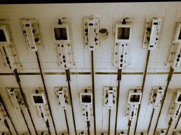 Système stratifié CFRP précontraint pour le renforcement des ponts