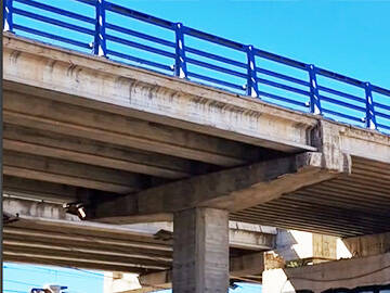 Renforcement d'un pont multi-poutres en béton précontraint par laminé CFRP et U-wrap