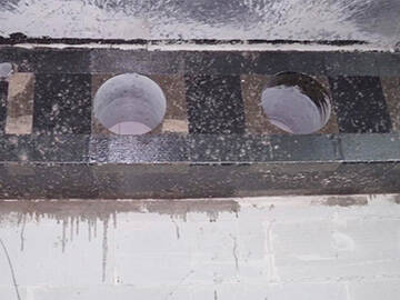 Renforcement des ouvertures de poutres en béton armé par tissus de fibre de carbone